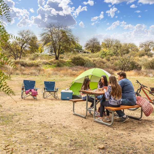 Family enjoying time together camping at Vail Lake Temecula KOA